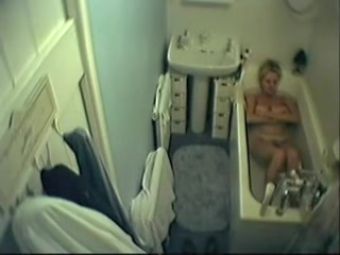 Hot Wife Amateur mature spied masturbating in the full bath KindGirls - 1